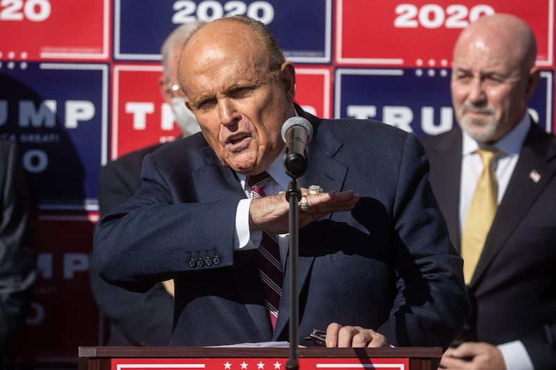 Rudy Giuliani: was ordered to pay poll workers Ruby Freeman and Shaye Moss $148m for defamation after repeating baseless allegations they doctored  they doctored the count using a USB stick. Photograph: Chris McGrath/Getty Images