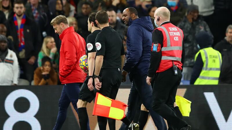 Patrick Vieira confronts referee Darren England during Crystal Palace’s defeat to West Ham. Photograph: Marc Atkins/Getty