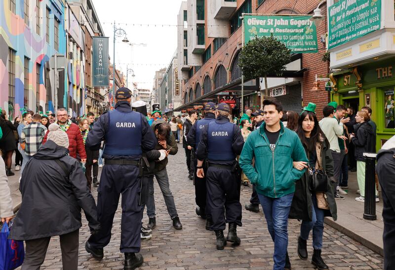 Gardaí on patrol in Temple Bar after this year's St Patrick's Day parade. Photograph: Alan Betson
