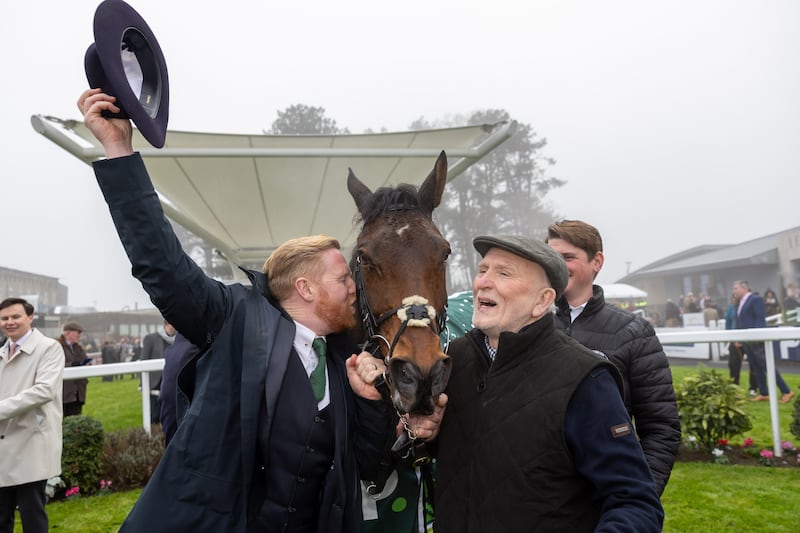 Winning owners Neil and Con Sands celebrate winning the Paddy`s Rewards Club Steeplechase with Solness at Leopardstown. Photograph: Morgan Treacy/Inpho