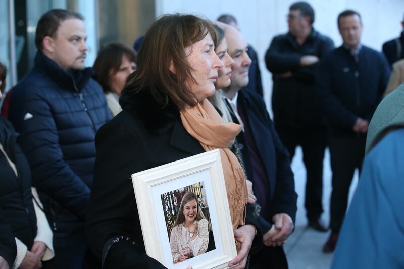 Ashling Murphy's mother Kathleen holds a photo of her daughter outside the Criminal Courts of Justice after the verdict. Photograph: Collins Courts