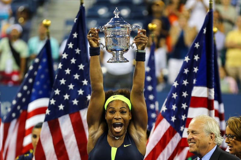 Serena Williams lifts the US Open trophy after defeating Victoria Azarenka in 2012.  Photograph: Al Bello/Getty