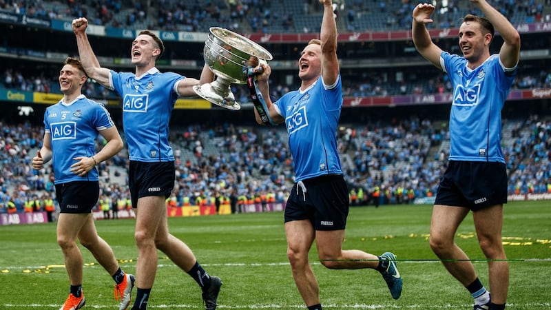 Dublin’s John Small, Brian Fenton, Ciarán Kilkenny and Cormac Costello celebrates after the game. Photograph: Tommy Dickson/Inpho