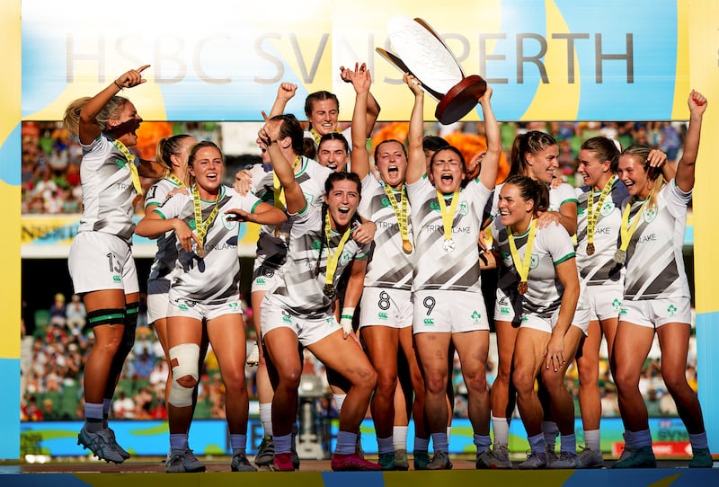 The Ireland team celebrate with the trophy in Perth. Photograph: Travis Hayto/Inpho