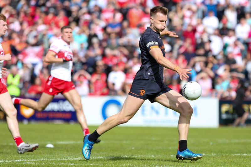 Armagh's Rian O'Neill goes through to score their third goal against Derry. Photograph: Lorcan Doherty/Inpho