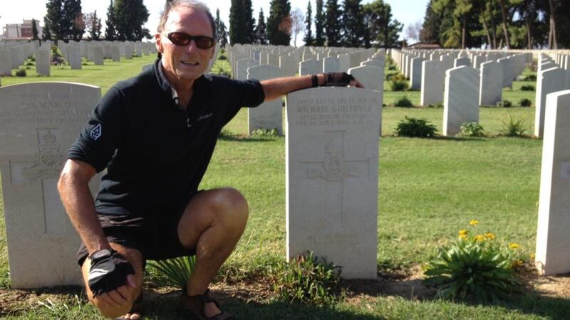 Michael Guilfoyle at his grandfather’s grave in Thessaloniki