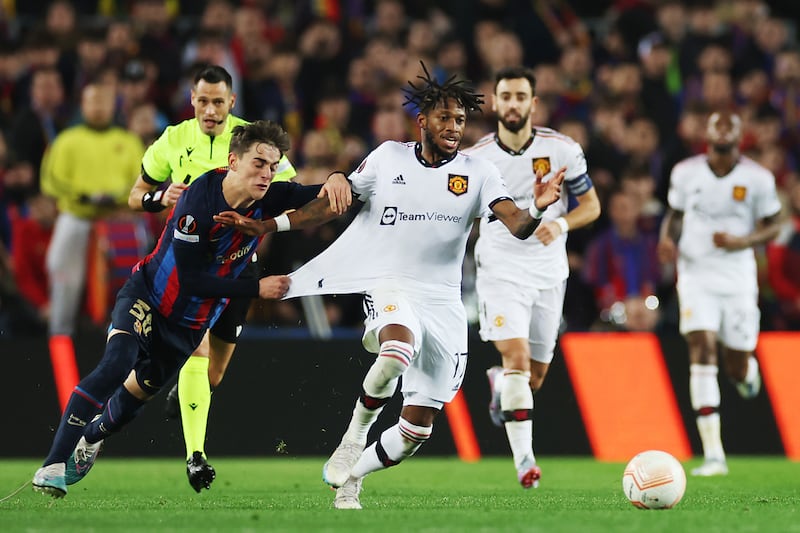 Barcelona's Gavi grabs the shirt of  Manchester United's Fred during the game at the Camp Nou. Photograph: Isabel Infantes/PA Wire