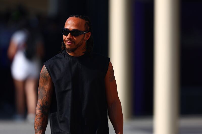 Lewis Hamilton walks in the Mercedes paddock prior to practice at the Abu Dhabi Grand Prix at the Yas Marina Circuit. Photograph: Joe Portlock/Getty Images