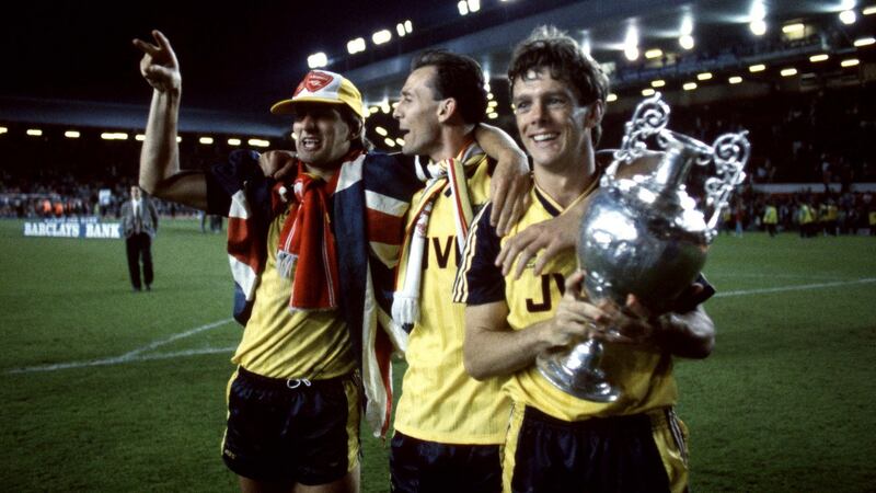 David O’Leary with the trophy afetr Arsenal’s title win at Anfield. Photograph: Mark Leech/Getty