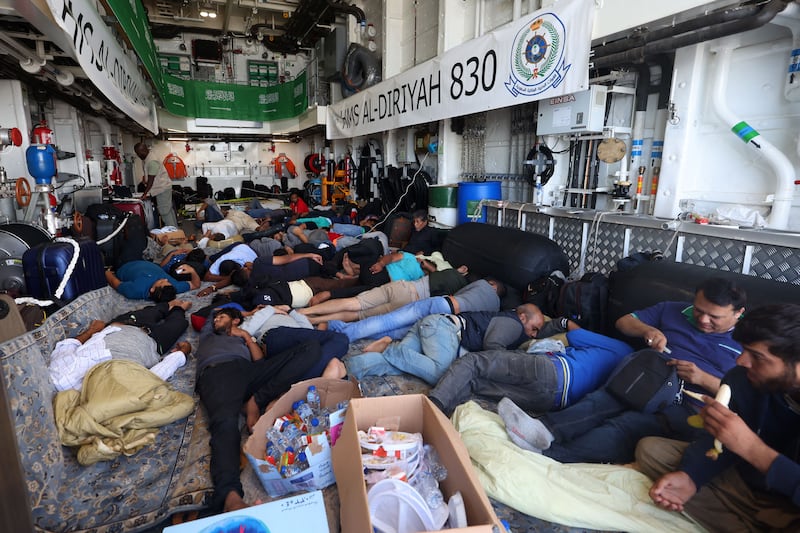 Evacuees rest onboard a Saudi vessel docked off the seaport of Port Sudan. Photograph: Fayez Nureldine/AFP/Getty Images