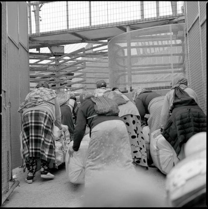 Women are used by smugglers to carry bundles across the border of up to 80kg.