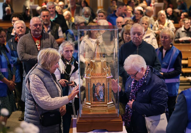 People queue for the Veneration of the Relics of Saint Bernadette to Our Lady of Victories Church, Ballymun Road, Dublin. Photograph: Dara Mac Dónaill / The Irish Times
