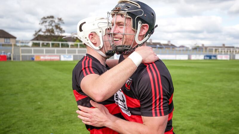 Ballygunner’s Dessie Hutchinson and Ian Kenny celebrate their side’s victory. Photograph: Laszlo Geczo/Inpho