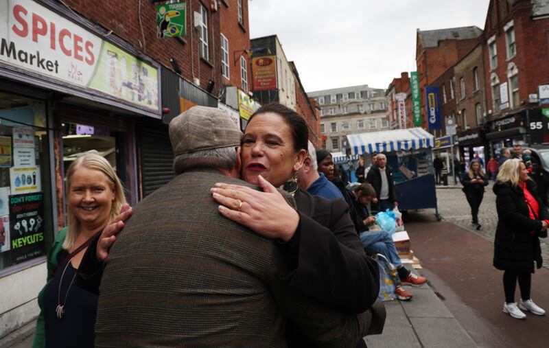 Sinn Féin leader Mary Lou McDonald is hugged by a supporter on Moore Street, Dublin, on Sunday. Photograph: Bryan O’Brien

