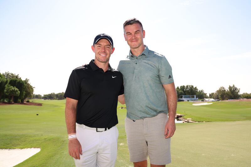 Rory McIlroy of Northern Ireland poses for a photo with Johnny Sexton. Photograph: Oisin Keniry/Getty