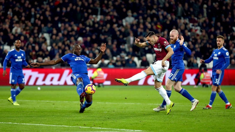 Lucas Perez opens the scoring for West Ham against Cardiff. Photograph: Dan Istitene/Getty