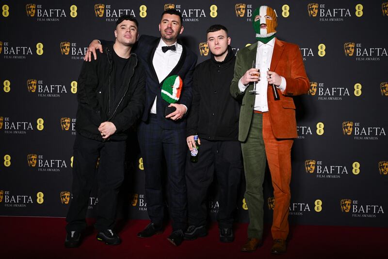 Baftas 2025: Writer and movie director Rich Peppiatt with Irish rap trio Kneecap. Photograph: Justin Tallis/AFP