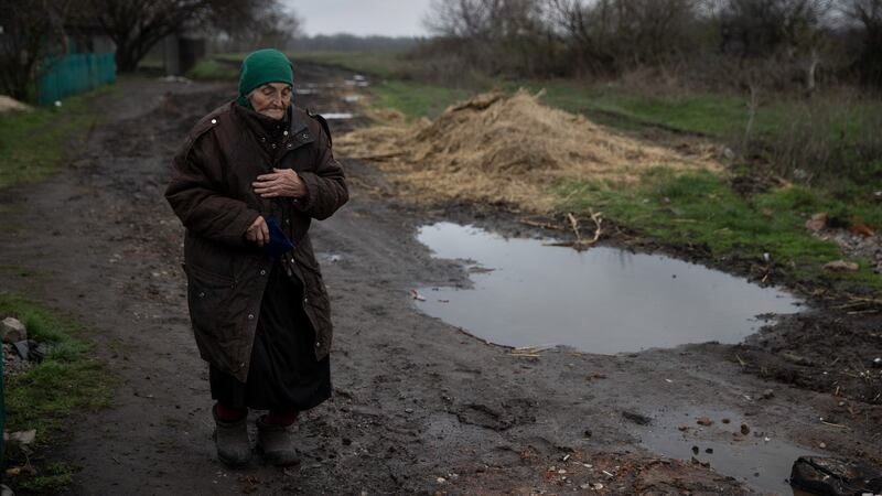 A woman who remained in the agricultural village of Husarivka, Ukraine, during the Russian occupation. Photograph: Tyler Hicks/The New York Times