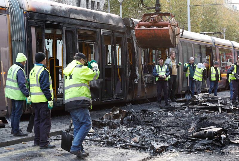 A burnt-out Luas carriage on O'Connell Street after the Dublin riots in November last year. Photograph: © RollingNews.ie