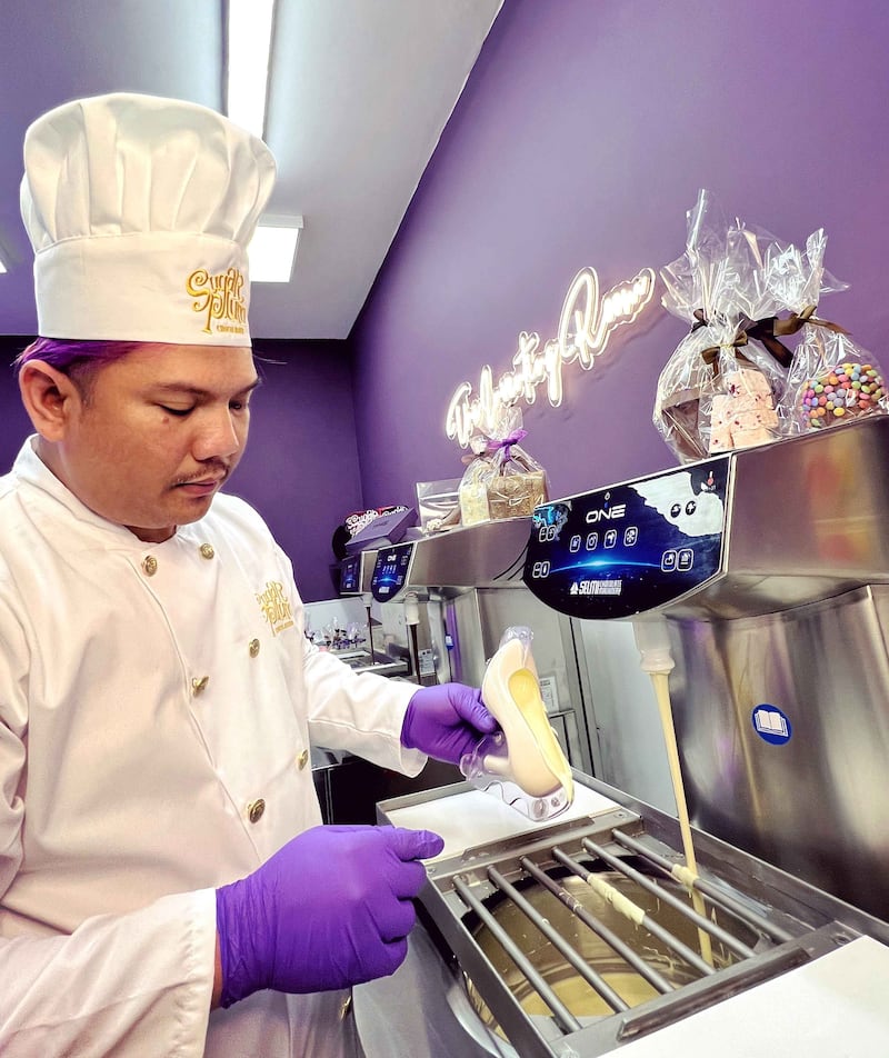 Chocolatier at work in Sugar Plum Sweetery kitchen