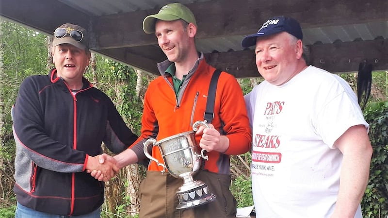 Winner Stephen Lydon (centre) of the Cong competition with club officers.