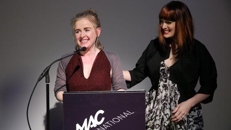 Ana Matronic (right) from the Scissor Sisters announces Northern Ireland-born Mairead McClean as the winner of the MAC International £20,000 open arts prize at the MAC in Belfast. Photograph: Kelvin Boyes/Press Eye /PA Wire