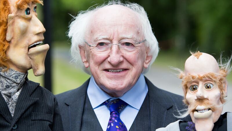 President Michael D Higgins hosted a Bloomsday garden party where puppets Eamon and Pascal from the Your Man’s Puppets in Galway made an appearance. Pic Tom Honan.