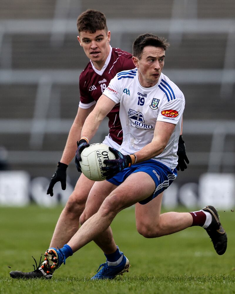 Shane Carey of Monaghan competes against Galway's Paul Kelly. Photograph: Ben Brady/Inpho