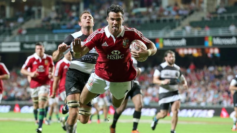 Mike Phillips scores his second try against the Barbarians. Photograph: Dan Sheridan/Inpho