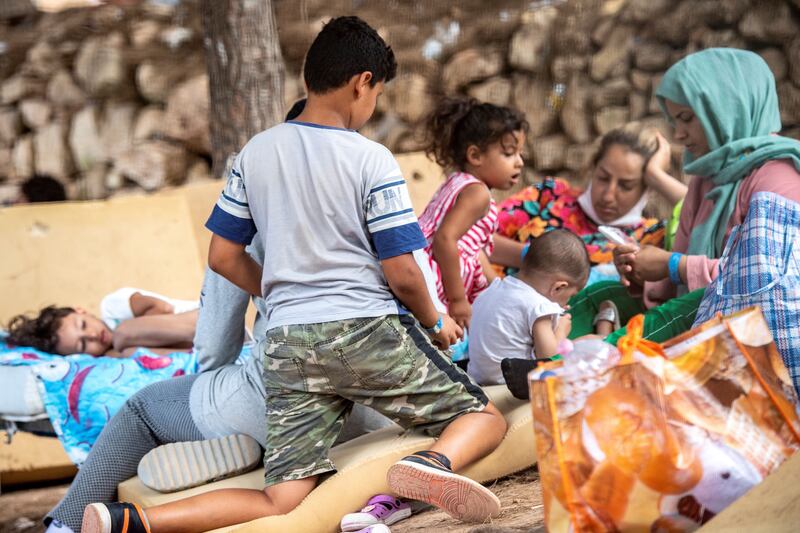 Children and women in the so-called migrant "Hotspot" operational processing facility on the southern Italian Pelagie Island of Lampedusa, south of Sicily, in July 2022. Photograph: Alessandro Serrano/AFP via Getty