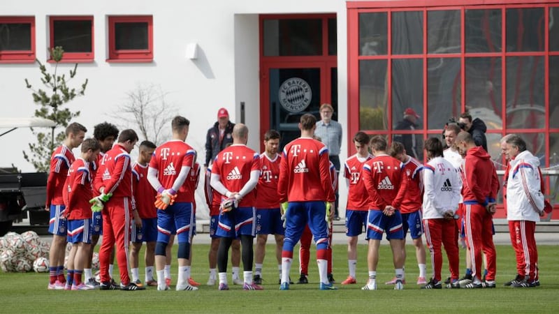 FC Bayern Munich players hold a minute silence to pay tribute to the passengers who were on Germanwings flight 4U9525. Photograph: Adam Pretty/Bongarts/Getty Images