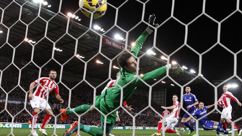 Chelsea’s John Terry (2nd right) scores the opening goal past Stoke City’s Asmir Begovic   at the Britannia Stadium. Photograph: Darren Staples / Reuters