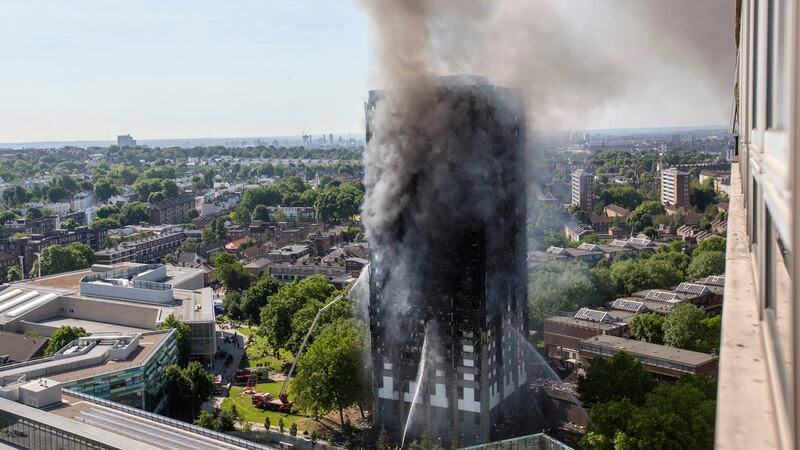 Smoke billows from a fire that has engulfed the 24-storey Grenfell Tower in west London. Photograph: Rick Findler/PA Wire