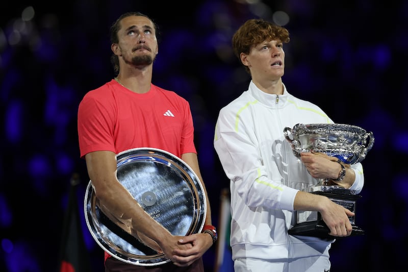 Jannik Sinner and Alexander Zverev during the trophy presentation at the Australian Open. Photograph: Clive Brunskill/Getty Images