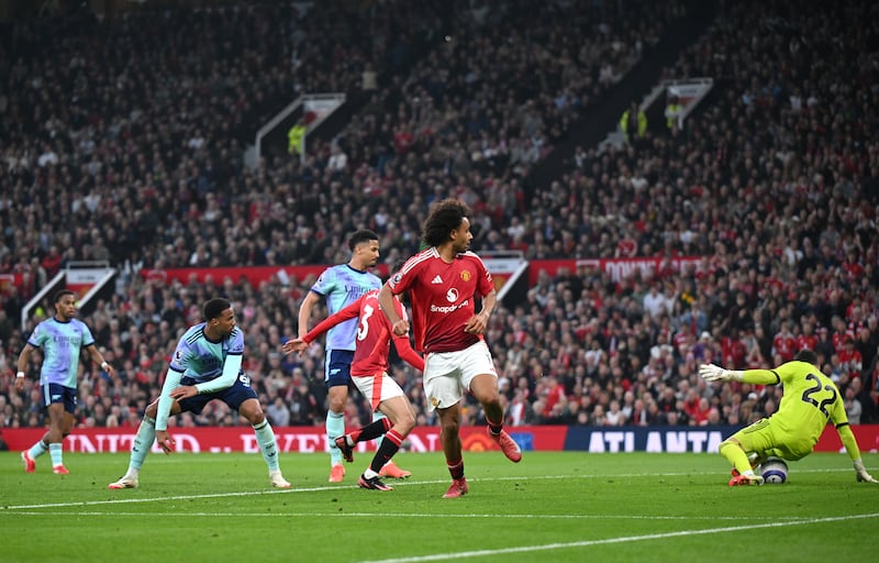 Arsenal goalkeeper David Raya makes a save from Manchester United striker Joshua Zirkzee during the Premier League match at Old Trafford. Photograph: Michael Regan/Getty Images