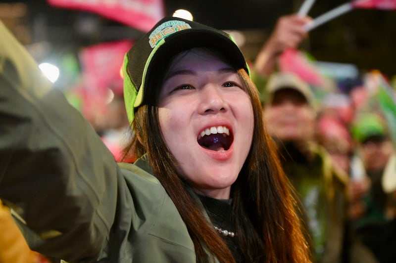 A supporter of Taiwan presidential candidate Lai Ching-te, from the ruling DPP during a campaign rally in Taipei. Photograph: Sam Yeh/AFP/Getty Images