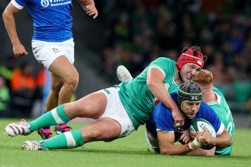 Italy's Juan Ignacio Brex is tackled by Ireland's Tom Stewart during the game at the Aviva Stadium. Photograph: Paul Faith/AFP via Getty Images