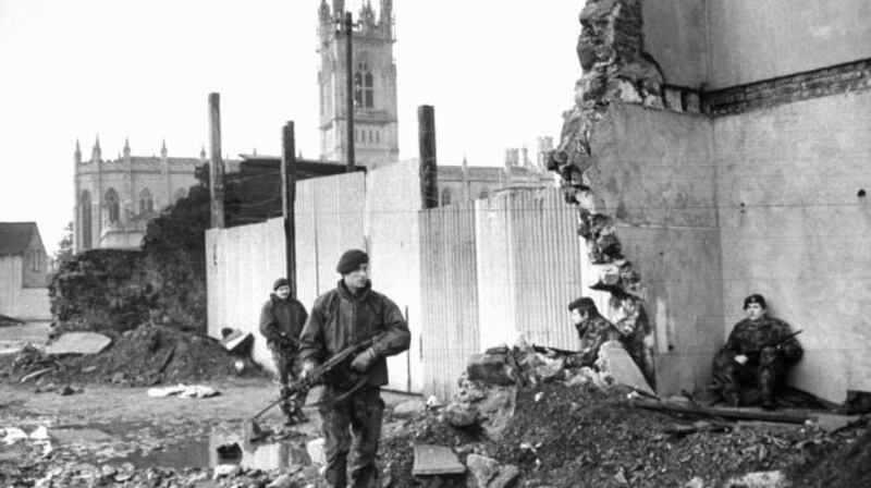 British soldiers patrol the bombed out ruins of the Broadway Hotel in Newry, Co Down in 1972. Internment was introduced the year before, at the height of the Troubles. Photograph: Terence Spencer/The Life Picture Collection/Getty.