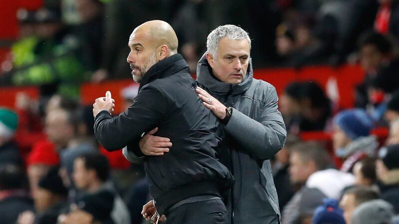 Mourinho and Guardiola shake hands after the game. Photo: Martin Rickett/PA Wire