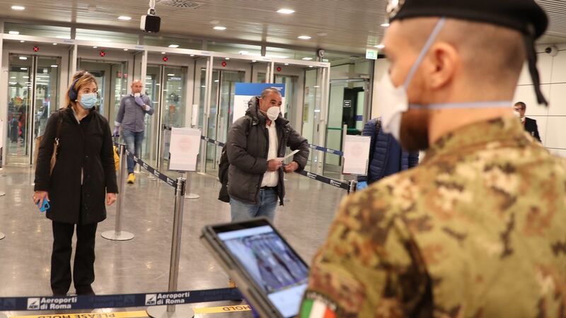 Thermal camera monitors are used to check the body temperature of passengers at Fiumicino airport, near Rome, Italy, on Wednesday, as the country remains on lockdown in an attempt to halt the spread of coronavirus. Photograph: Emanuele Valeri/EPA