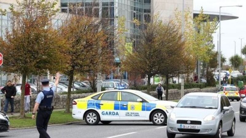 A garda at Citywest shopping centre in Dublin, at the time of the incident. Photograph: Niall Carson/PA Wire.