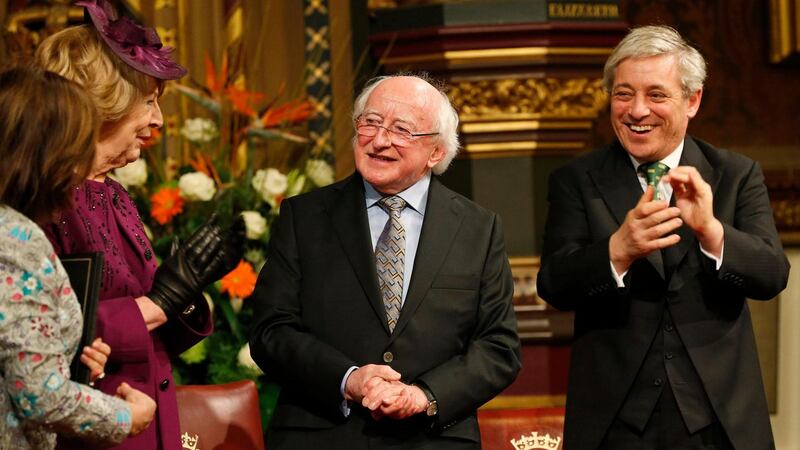 President Michael D Higgins, centre, is applauded by John Bercow , the Speaker of the House of Commons, his wife Sabina and Baroness D’Souza. Photograph: Lefteris Pitarakis/PA Wire