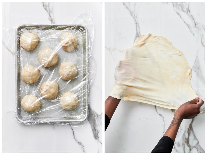 The portioned chapati dough can be stretched paper thin, a technique that helps create delicate layers. Photograph: Kelly Marshall for The New York Times