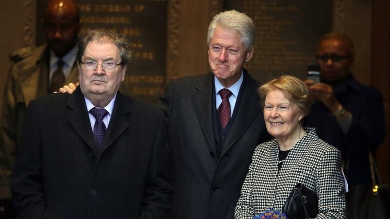 Former US president Bill Clinton  with former SDLP leader John Hume and Mr Hume’s  wife, Pat, at the Guildhall in Derry yesterday. Photograph: Paul Faith/PA Wire