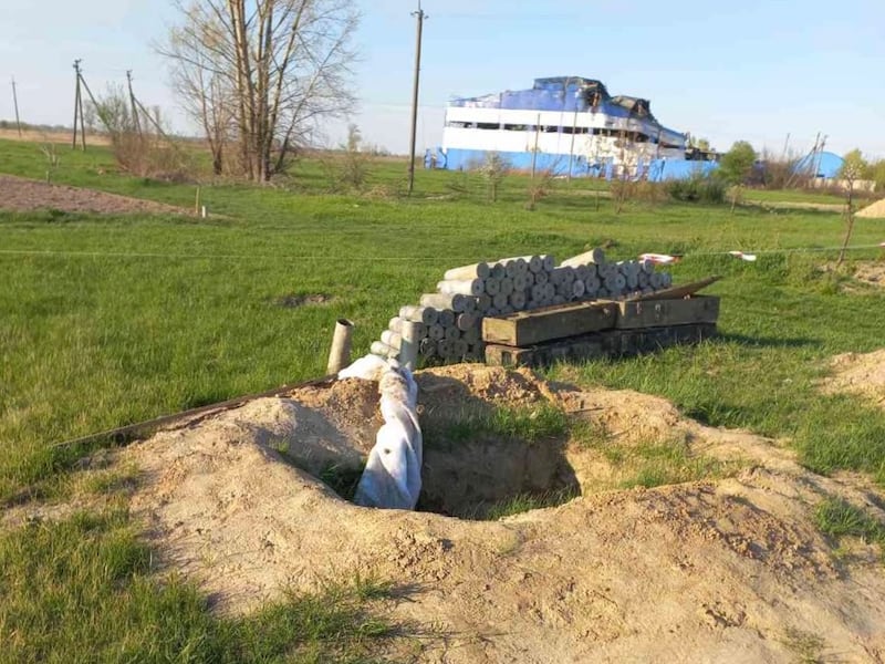 Russian military positions behind the ruins of Nelya Honchar's house in the village of Kozarovychi, which Moscow's troops abandoned when they retreated from Kyiv region at the end of March 2022. Photograph courtesy of Nelya Honchar