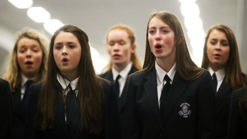 Pupils from Scoil Mhuire, Trim, Co Meath, warm up ahead of their performance during the Feis Ceoil at the RDS. Photograph: Brian Lawless/PA Wire