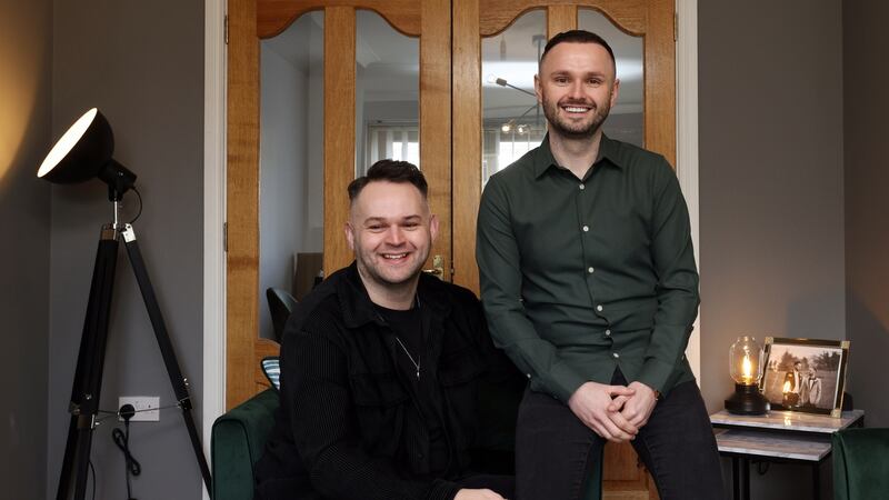 Karl Dawson and Michael Gibney lived in a log cabin before purchasing their home. Photograph: Laura Hutton