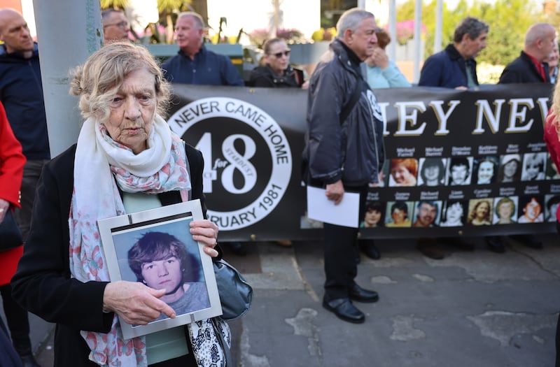 Gertrude Barrett, holds a photograph of her son Michael.
Photograph: Dara Mac Dónaill / The Irish Times

