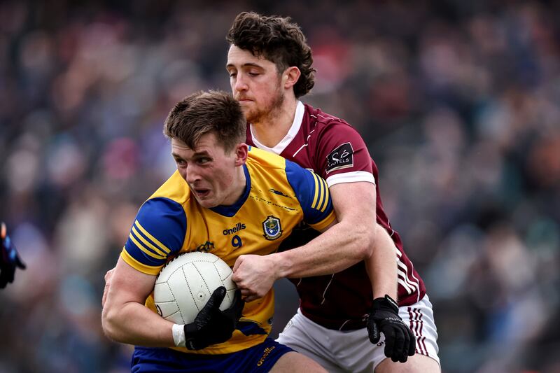 Roscommon's Dylan Ruane is tackled by Kieran Molloy of Galway. Photograph: Ben Brady/Inpho