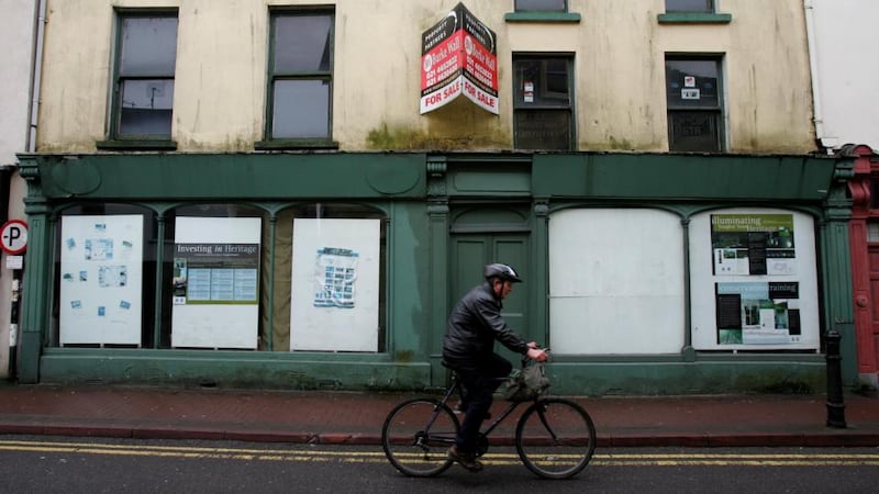 In recent years shops such as this one in Youghal, Co Cork have closed. Why are town councils not in charge of the repair or development of their towns when such councils would seem to be the most effective carers for towns? Photo: David Sleator/The Irish Times